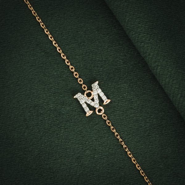DIAMOND-ENCRUSTED "M" GOLD BRACELET