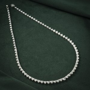 HEART-SHAPED DIAMOND TENNIS NECKLACE AND EARRING SET