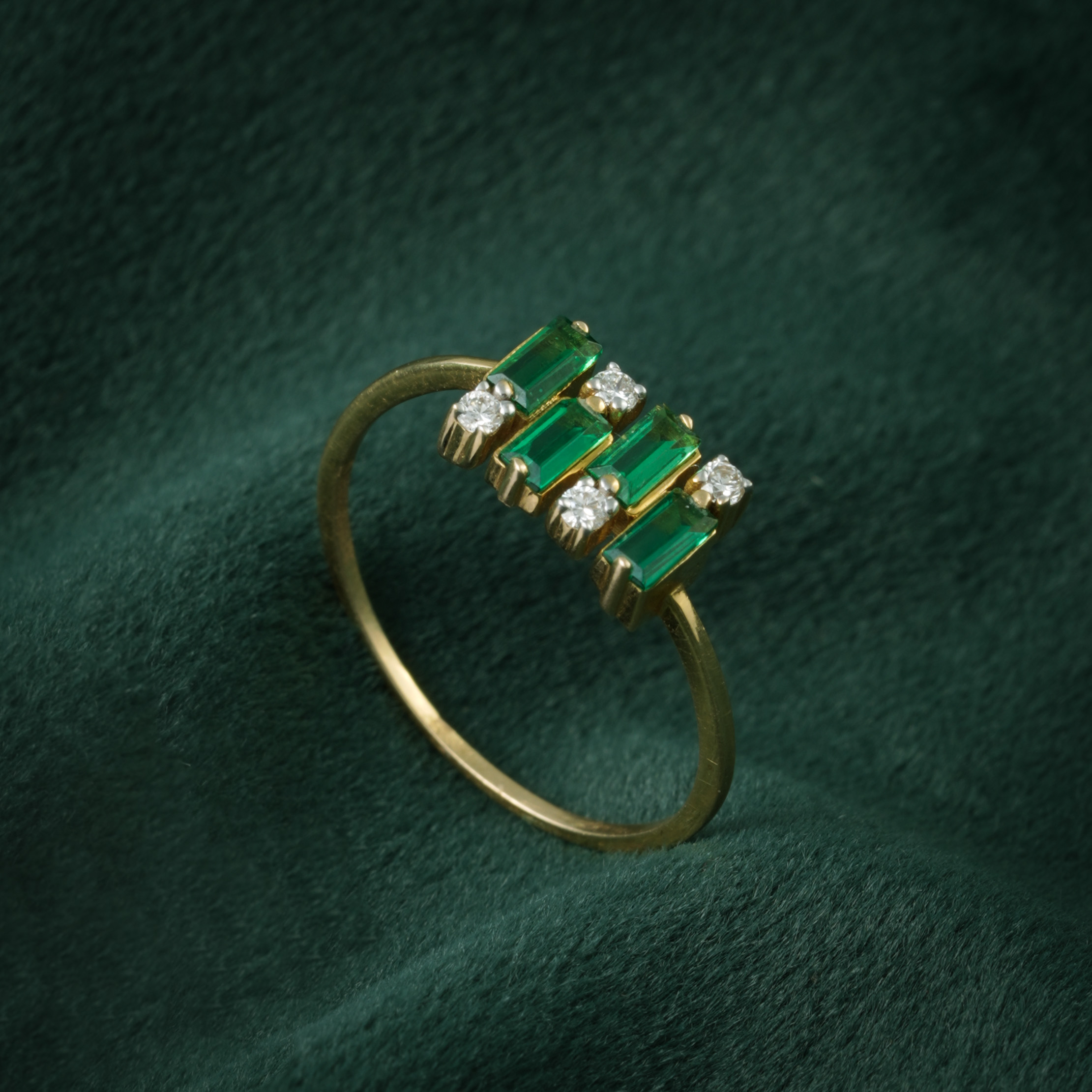EMERALD CUT GREEN STONE AND DIAMOND RING IN YELLOW GOLD