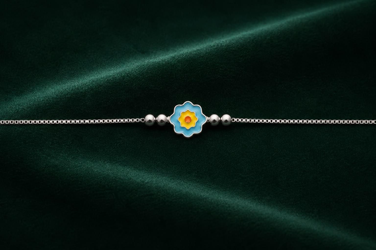 BLUE FLOWER SILVER RAKHI