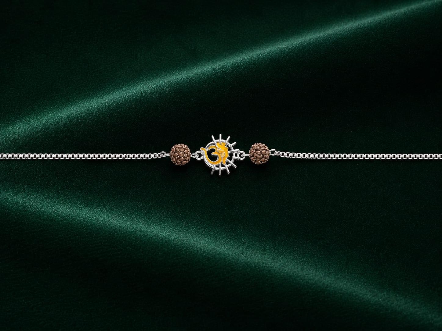 SILVER OM SUN CHARM RAKHI